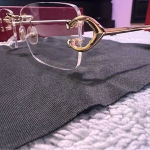 Cartier Rimless C decor Opticals